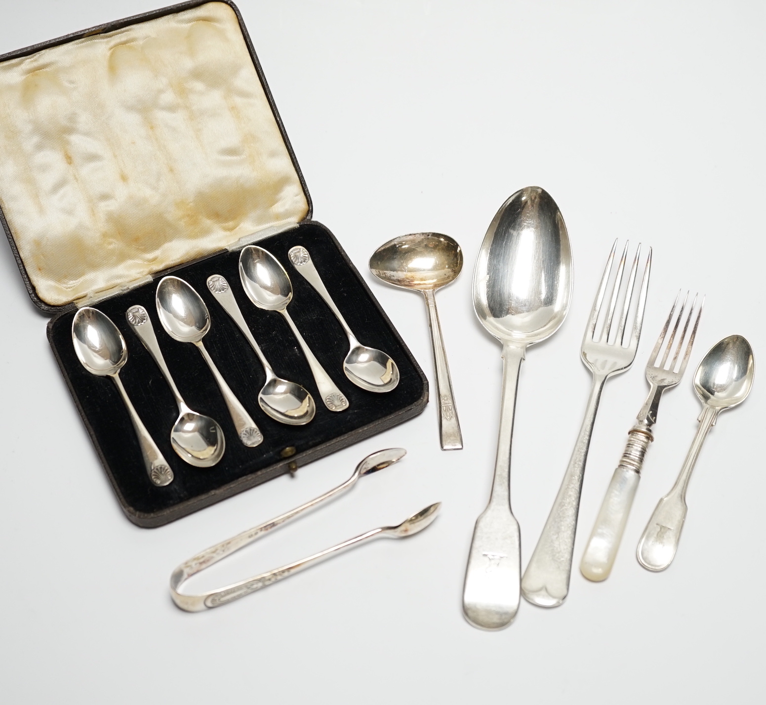 A group of assorted 19th century and late silver flatware, various patterns, dates and makers, including a set of six Hanovarian pattern dessert forks by George Adams, London, 1852(worn) and a cased set of six coffee spo